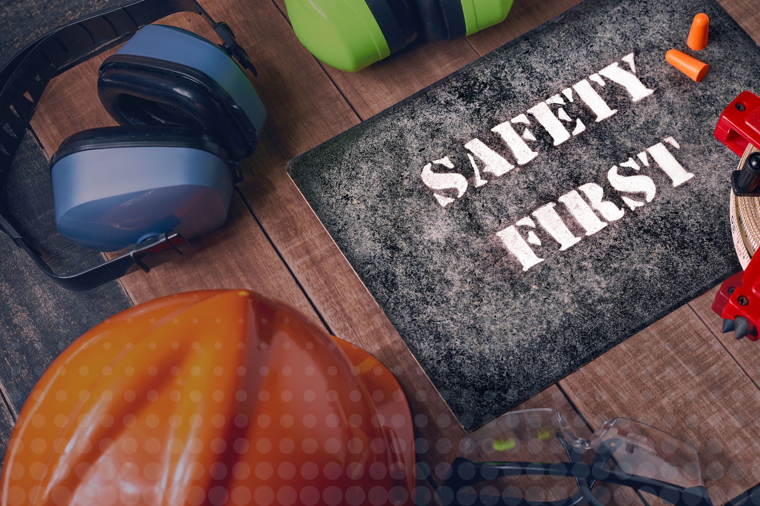Safety gear displaying the text “Safety First”.