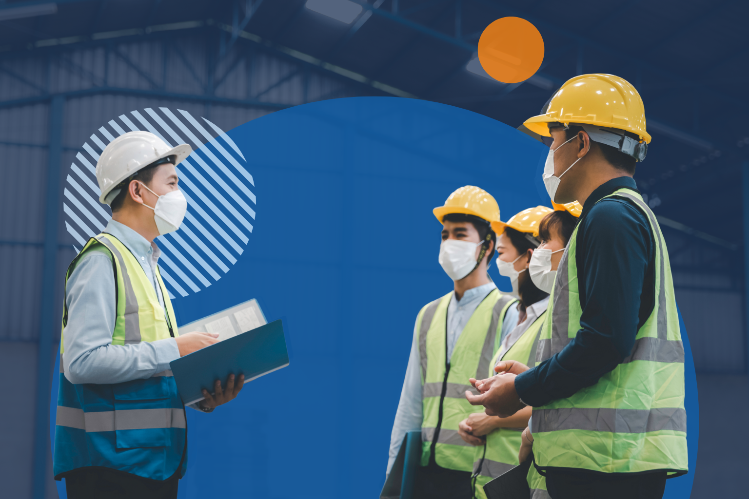 Experienced worker mentoring a colleague on workplace safety.