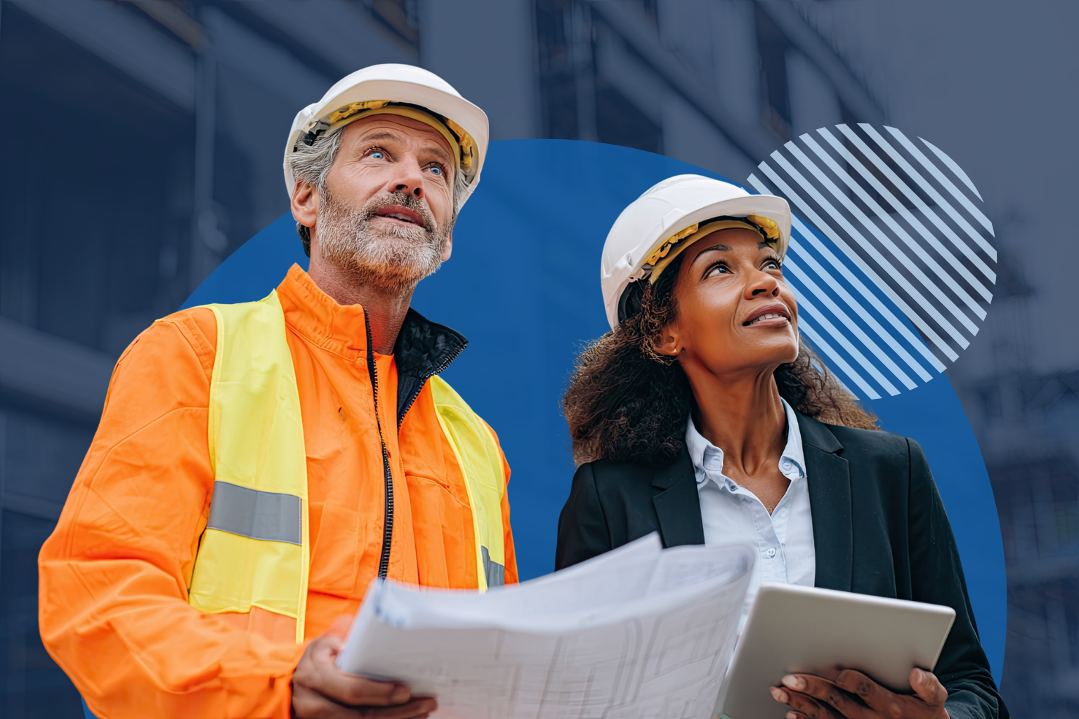 Workers reviewing safety information together on a job site.